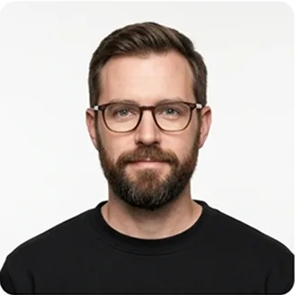 Nikhil Sharma, reviewer, a bearded man in round glasses and a black sweater